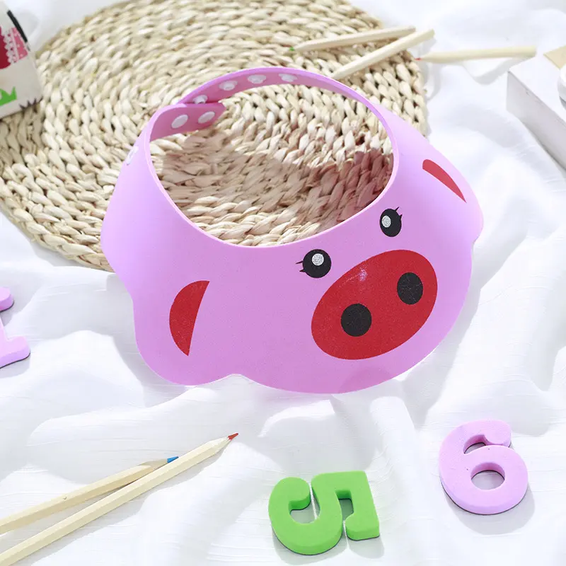Pink pig bath visor to protect face and ears