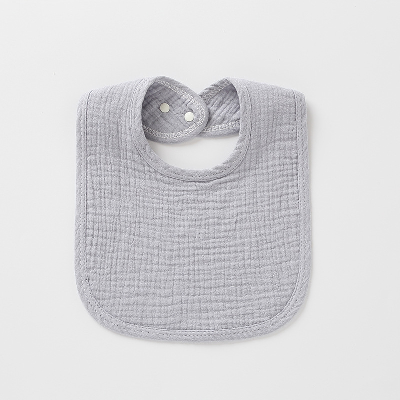 Bavoir gris en mousseline de coton ajustable